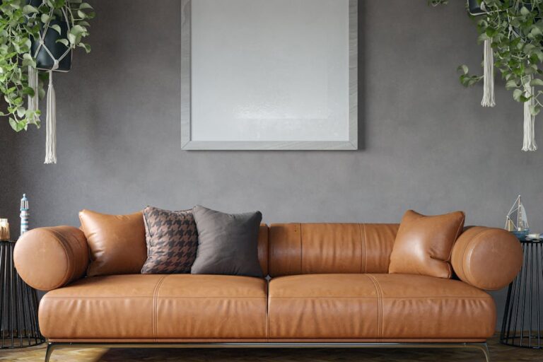 A large brown leather couch in a living room